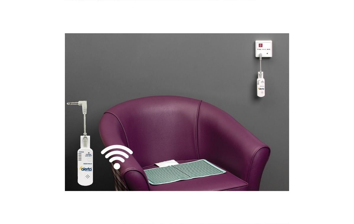 Wireless WetSense Chair Alertamat on top of armchair seat cushion next to wall point reciever